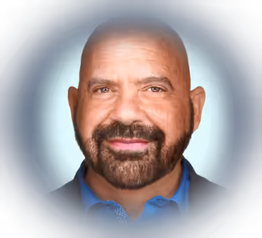 Portrait of Stephen Gilfus on a deep navy background with a soft halo